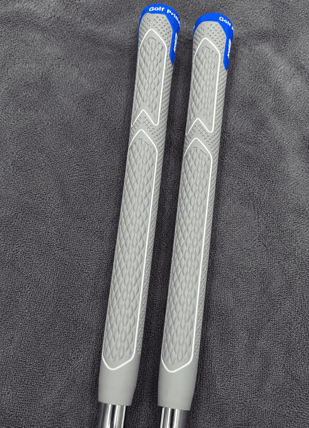 Club grips, deep cleaned golf shoes, after Fairway Fresh care