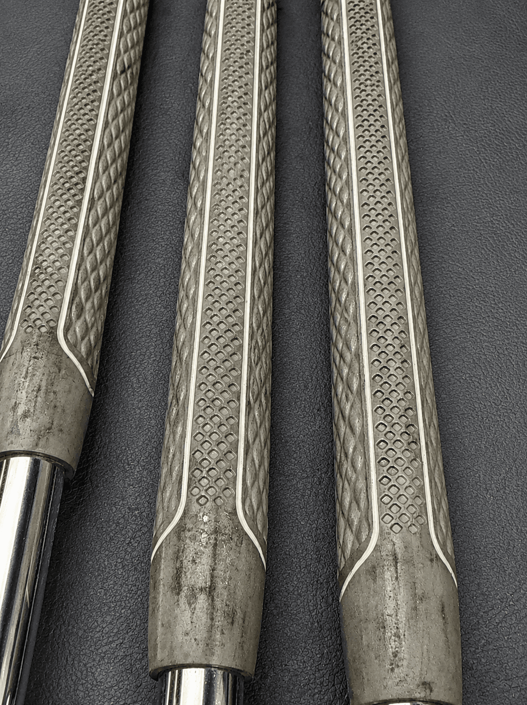 Club grips, deep cleaned golf shoes, before Fairway Fresh care